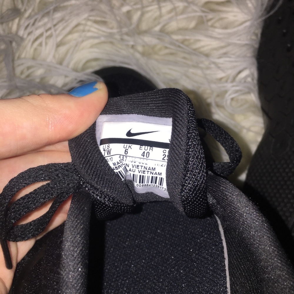 Black Nike running sneakers